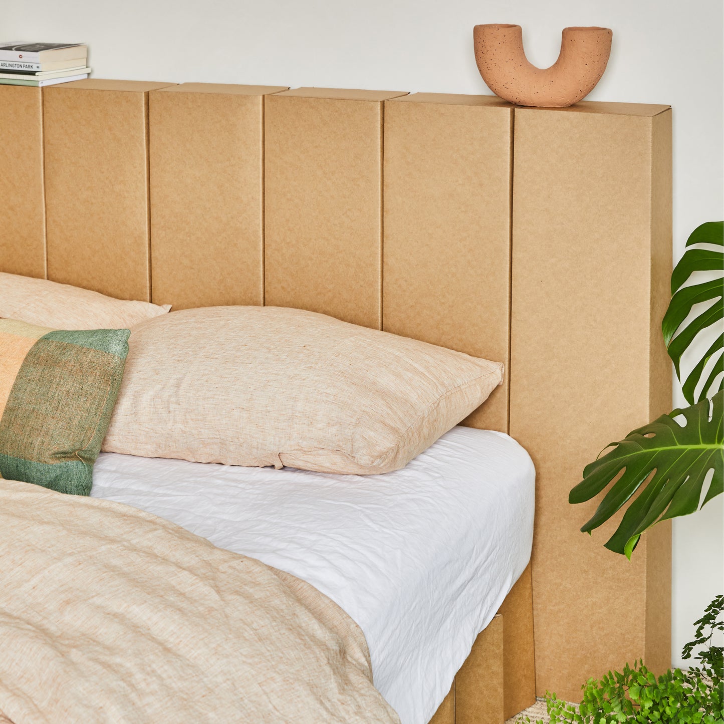 Close-up of Yona Cardboard Headboard base in natural finish