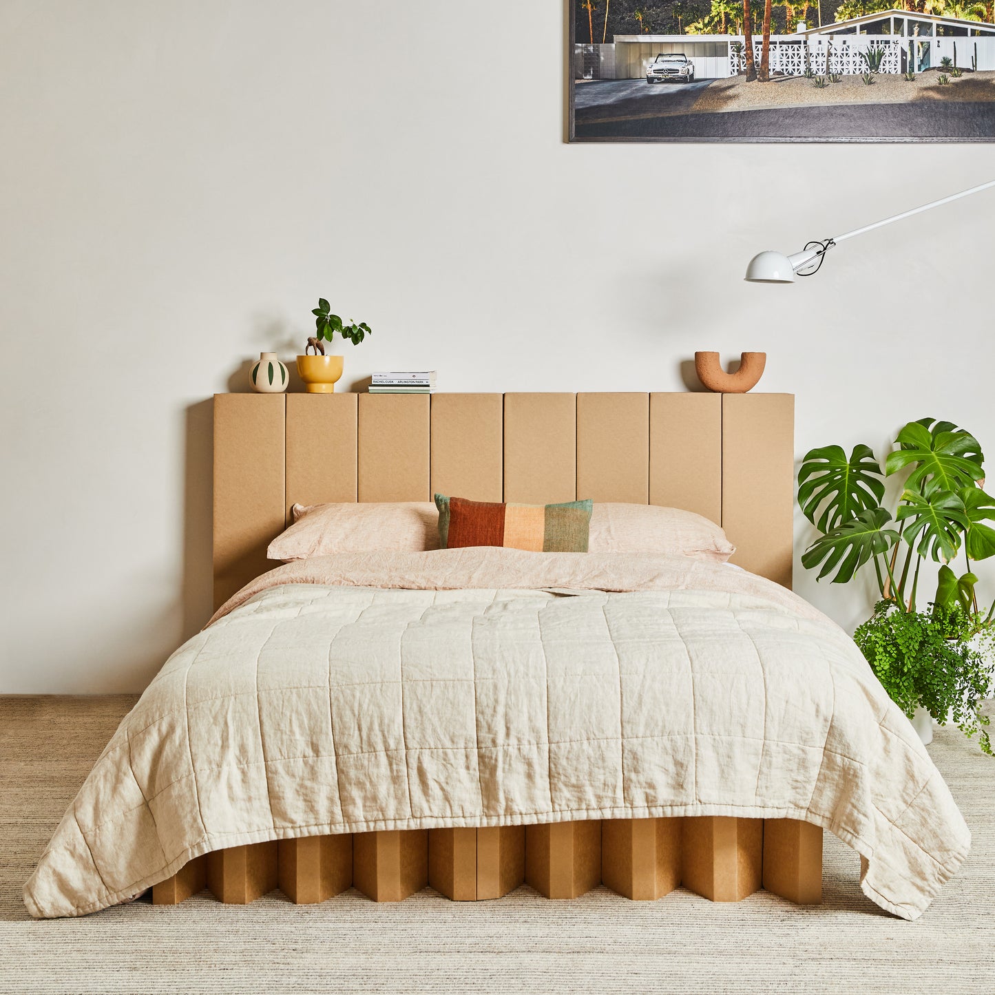 Yona Cardboard Bed with headboard in natural finish viewed from the front