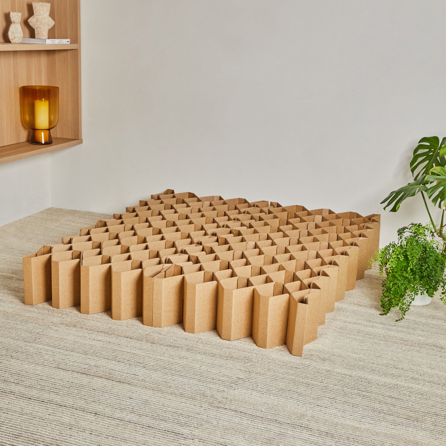 Yona Cardboard Bed base in natural finish expanded and bare to showcase honeycomb structure